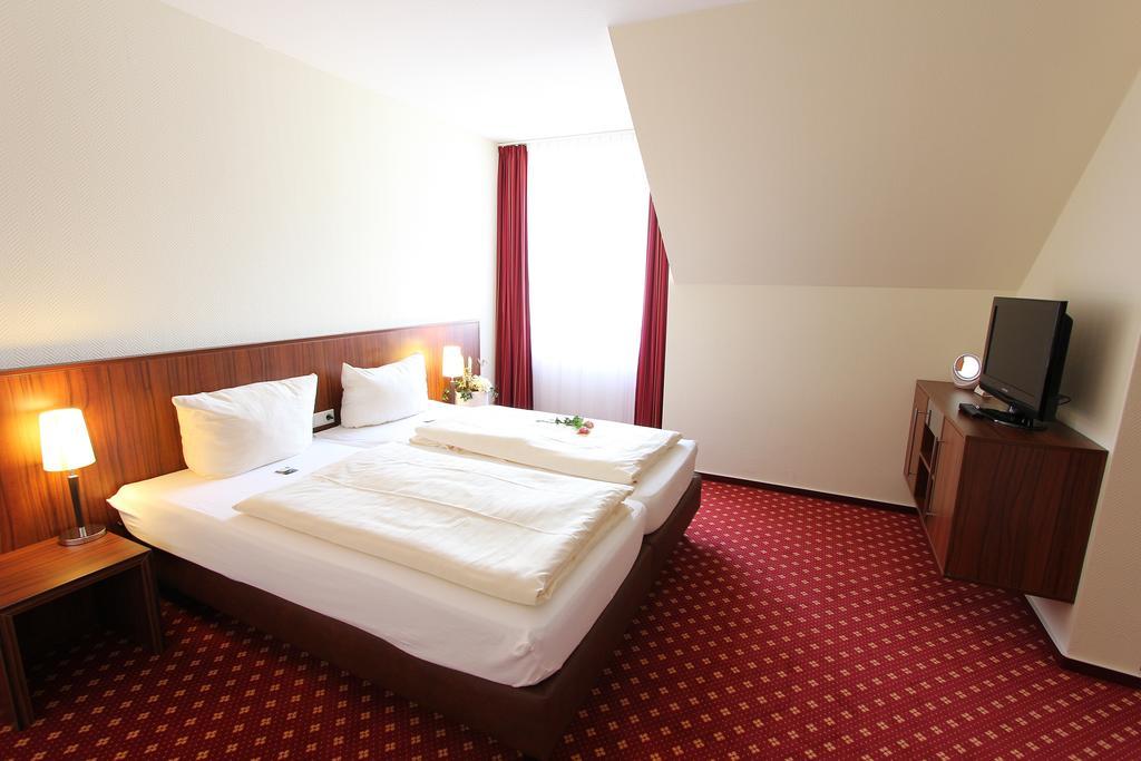 Akzent Hotel Jonathan Lippstadt Oda fotoğraf