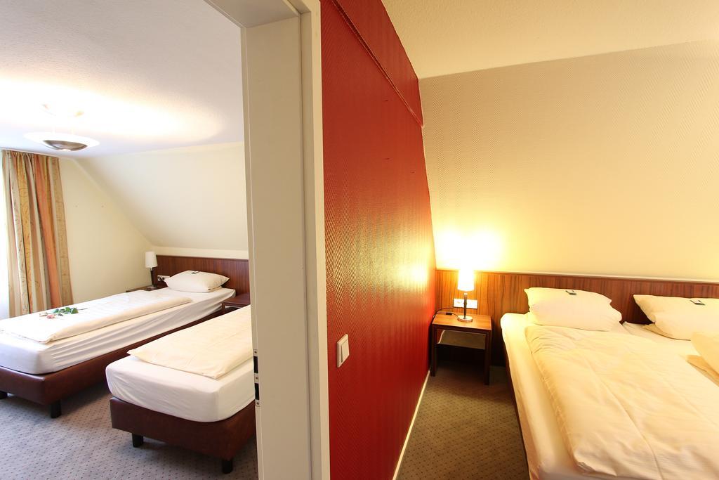 Akzent Hotel Jonathan Lippstadt Oda fotoğraf